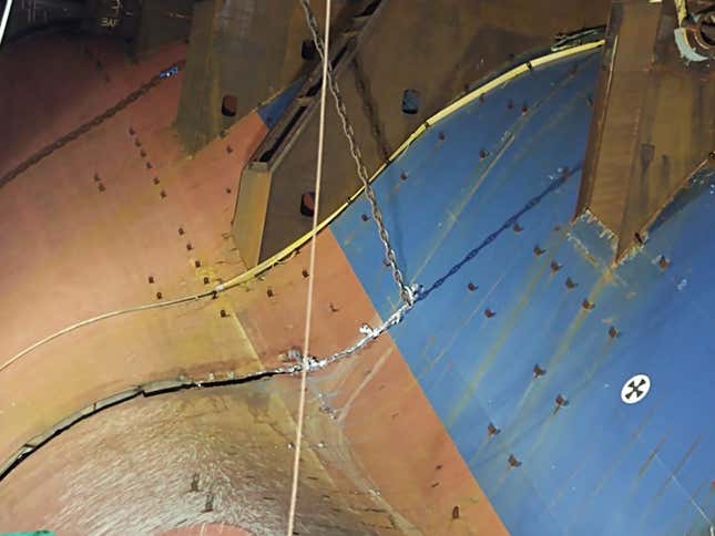 Image for article titled A Chain Just Cut Through A Capsized Cargo Ship Filled With Cars And The Process Is Fascinating (UPDATE W/VIDEO)