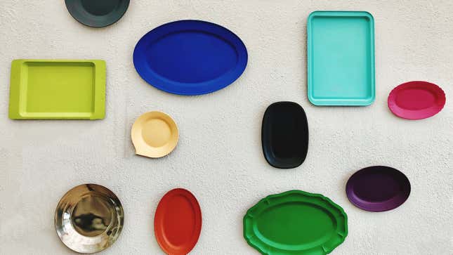 Overhead shot of colorful empty plates on table