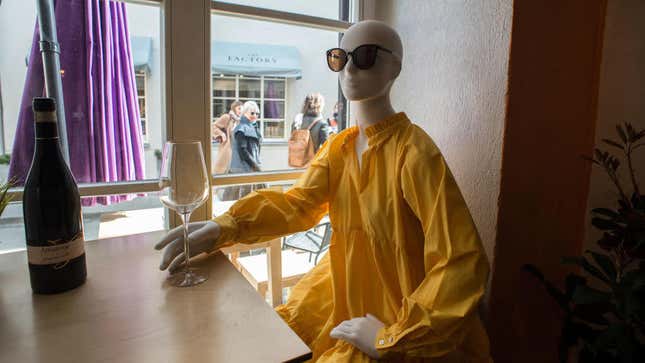 A mannequin dressed a creation of a local designer at a restaurant in the Old Town of Vilnius, Lithuania