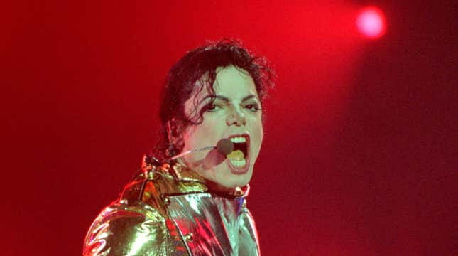 Michael Jackson performs on stage during is “HIStory” world tour concert November 10, 1996 in Auckland, New Zealand.
