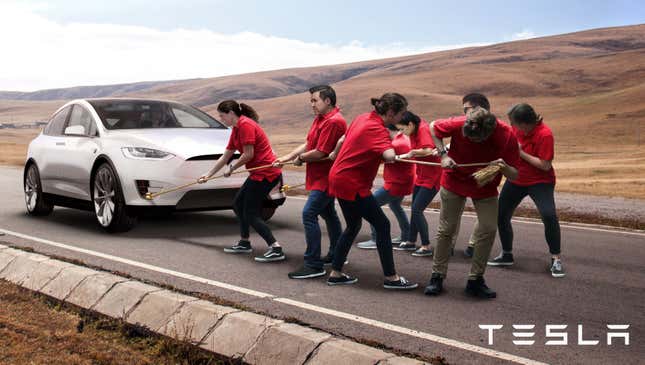 Image for article titled Elon Musk Unveils New Clean Energy Luxury Car Pulled By 8 Tesla Employees