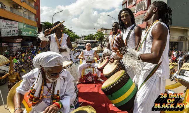 Members of the Afro-American group Jouvay Fest dance and play music in a parade in Abidjan, Côte d’Ivoire March 10, 2018.