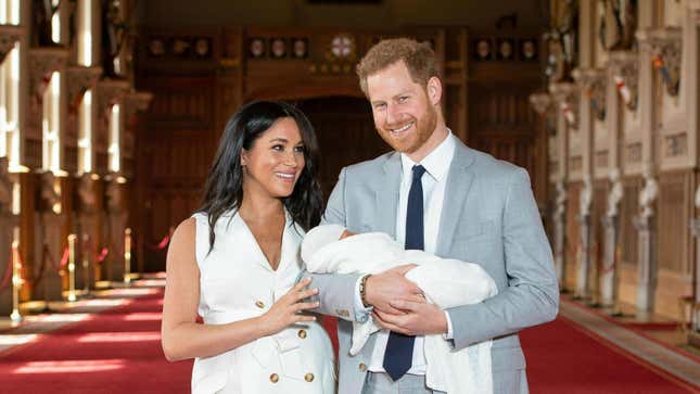 Britain’s Prince Harry and Meghan, Duchess of Sussex, during a photocall with their newborn son, in St George’s Hall at Windsor Castle, Windsor, south England, Wednesday May 8, 2019.