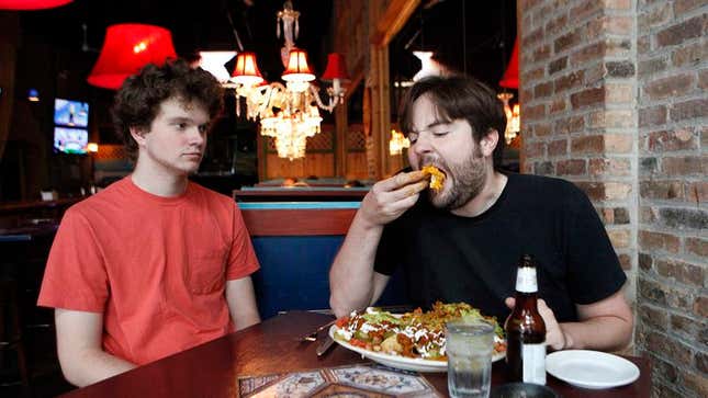 Image for article titled Restaurant’s Nacho Challenge Requires Participants To Watch Man Consume 3 Pounds Of Nachos