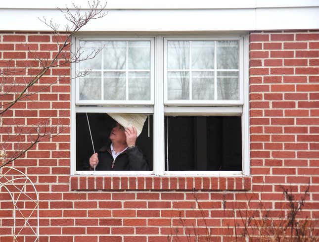 Image for article titled Entire Community Stops To Watch Man Struggling To Work Window Blinds