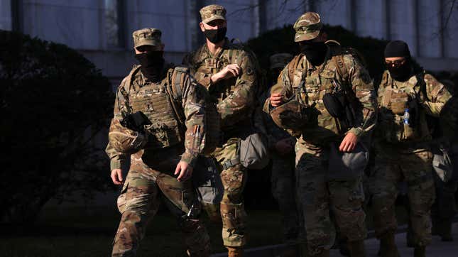 Members of the National Guard remain deployed in Washington, DC in March following deadly riots involving scores of QAnon conspiracy theorists at the Capitol on Jan. 6. 