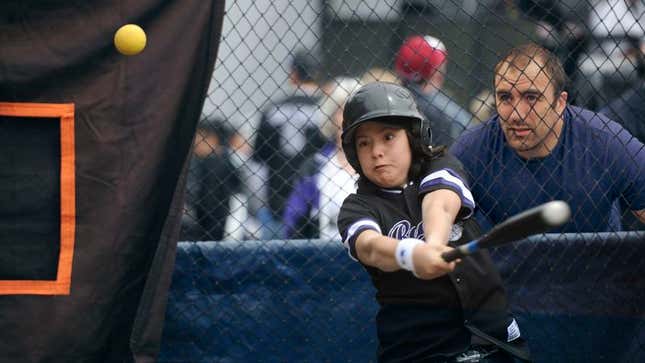 Image for article titled No One Seems To Know Guy Leaning Against Batting Cages Giving Hitting Advice