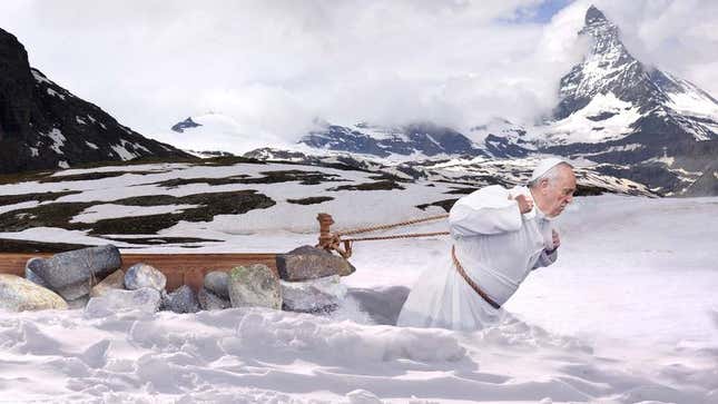 Image for article titled Pope Francis Trains For Easter Mass By Dragging Pew Loaded With Rocks Across Snow