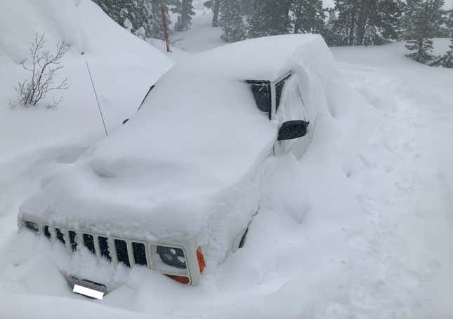 Image for article titled A Tesla Engineer's Jeep Ended Up Under 10 Feet of Snow for Months and It's Still There