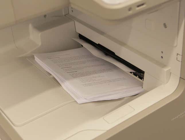 Image for article titled Single Document Engulfed In Coworker’s 50-Page Printout