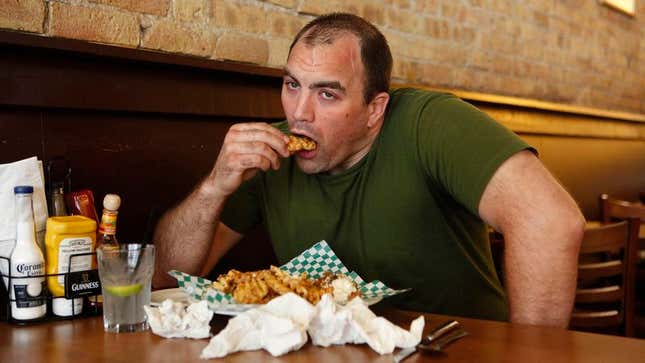 Image for article titled Man’s Body Running Out Of Ideas To Convince Him He Full