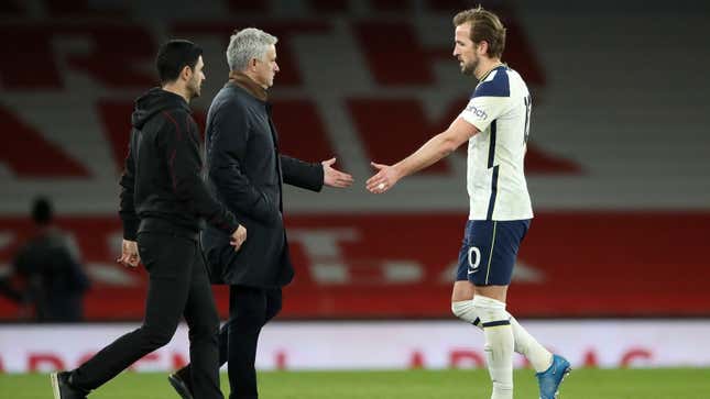 Spurs manager Jose Mourinho and Harry Kane shake hands after a March 14 loss to Arsenal.