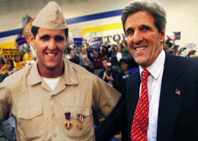Kerry (right) presents his running mate at a campaign event in Boston.