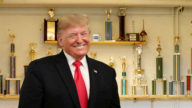 Image for article titled ‘And These Are My Nobel Peace Prizes,’ Says Trump, Gesturing Toward Room Of Plastic Trophies