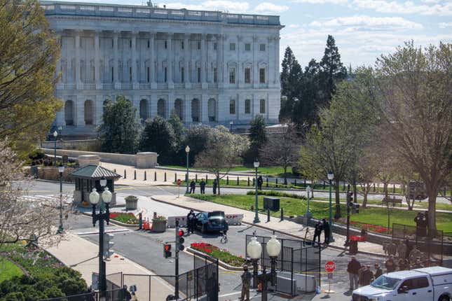 A car that crashed into a barrier near the US Capitol is seen on April 2, 2021 in Washington, DC. - One officer was killed and a second injured after a vehicle rammed through security and crashed into a barrier at the US Capitol, forcing it into lockdown less than three months after a mob assault on Congress. 