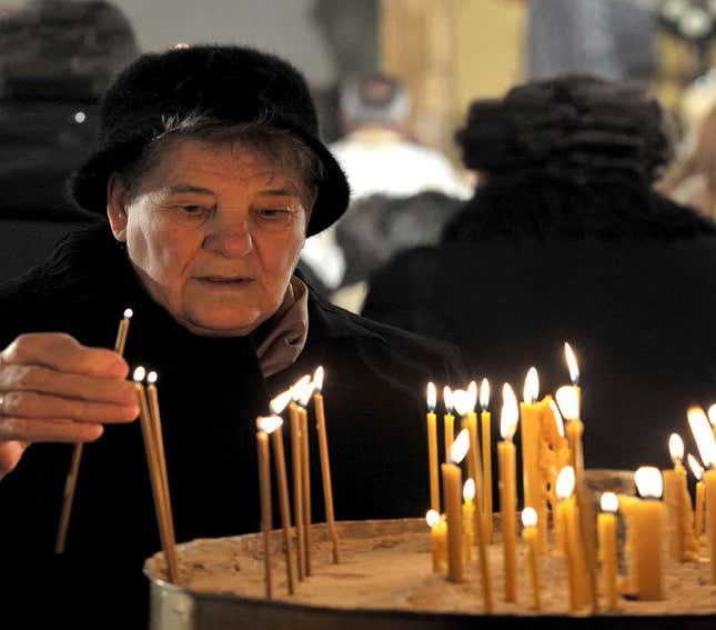 Image for article titled Churchgoer Blanks On Why She Is Lighting Votive Candle
