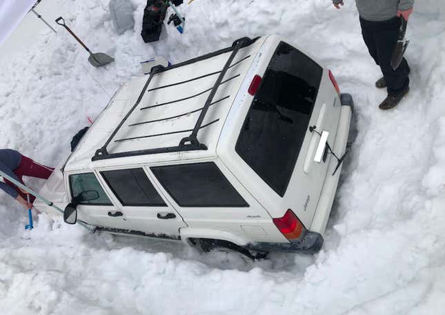 Image for article titled A Tesla Engineer's Jeep Ended Up Under 10 Feet of Snow for Months and It's Still There