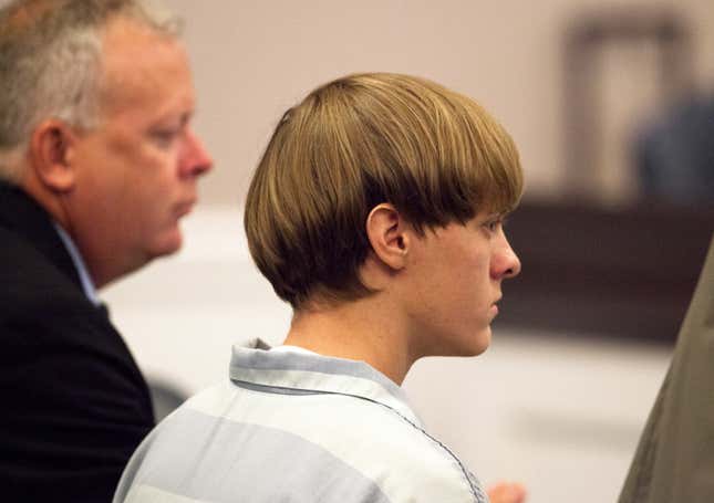 Dylann Roof, right, 21, listens to proceeding with assistant defense attorney William Maguire during a hearing at the Judicial Center July 16, 2015 in Charleston, South Carolina. Roof is charged with murdering nine worshippers at a historic black church in Charleston last month. 