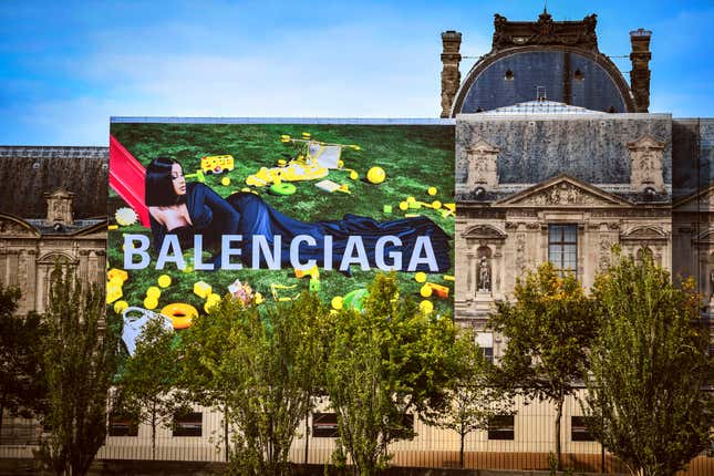 A picture taken on September 1, 2020, shows Cardi B, the new face of Balenciaga fashion brand, on a billboard on a wall of the Louvre Museum in Paris. (Photo by STEPHANE DE SAKUTIN / AFP) (Photo by STEPHANE DE SAKUTIN/AFP via Getty Images)