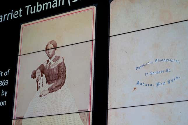 A previously unknown portrait, c. 1868, of abolitionist and Underground Railroad conductor Harriet Tubman is projected on a screen before the unveiling of the photograph at The Smithsonian’s National Museum of African American History and Culture in Washington, on March 25, 2019. 