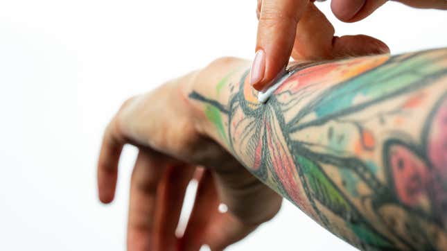 Image for article titled How to Keep Your Tattoos Looking New for Longer