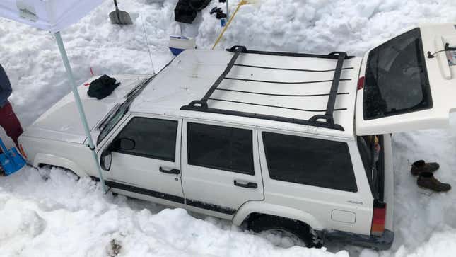 Image for article titled A Tesla Engineer's Jeep Ended Up Under 10 Feet of Snow for Months and It's Still There
