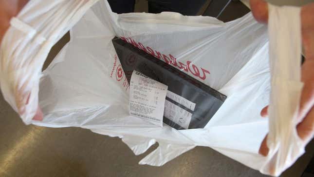 Image for article titled Receipt Brazenly Placed In Bag Without Permission