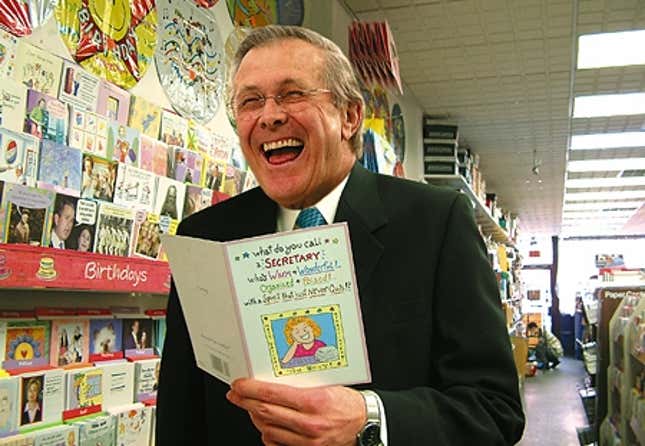 Rumsfeld reads the Secretary's Day cards in a DC-area drugstore.