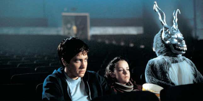 Donnie darko in a theater with a giant bunny