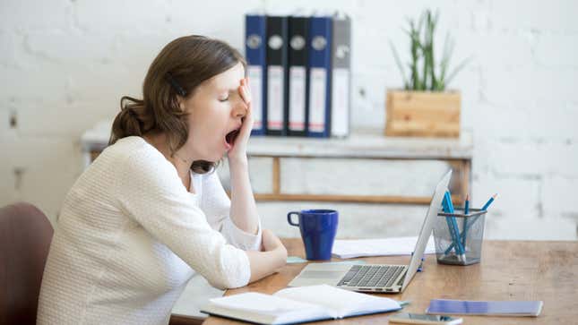 person yawning at work