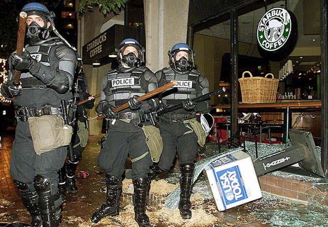 Riot police stanch the onslaught of angry upper-middle-class Americans in Boston.