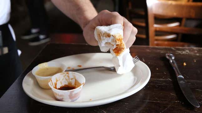 Image for article titled Breaking: Waiter Picking Up Napkin With Bare Hand