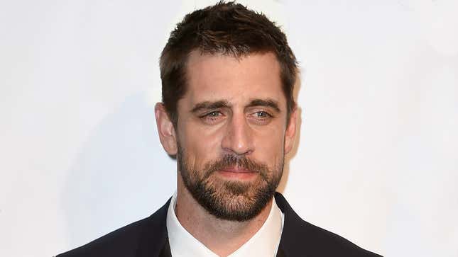 Why is Aaron Rodgers growing out his hair?