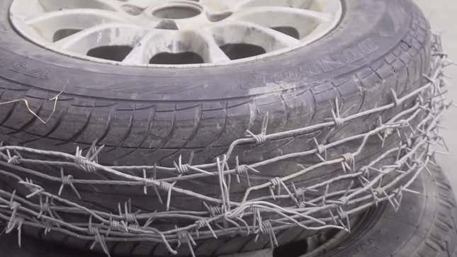 Image for article titled Our Favorite Russians Attempt To Make Studded Tires Using Barbed Wire