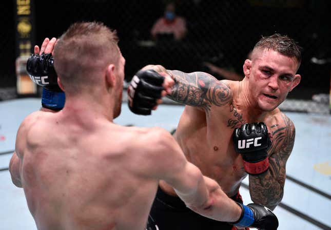 Dustin Poirier, right, punches Dan Hooker in their lightweight fight during UFC’s Fight Night in Las Vegas.