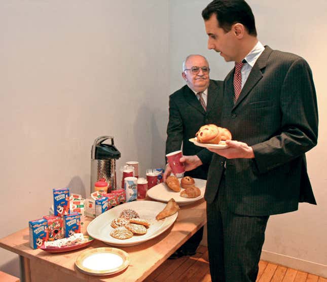 Syria's president and prime minister hold an emergency meeting near the coffee.