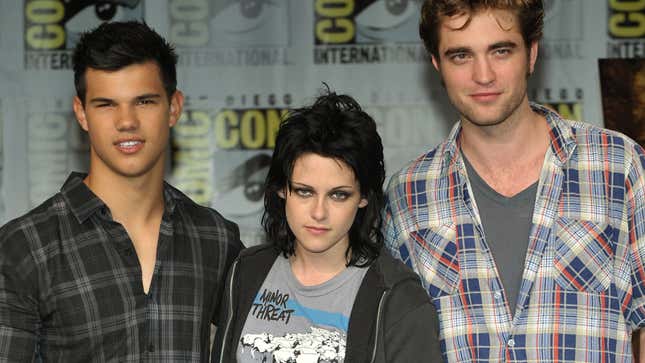 Taylor Lautner, Kristen Stewart and Robert Pattinson at a press conference for The Twilight Saga: New Moon press conference during Comic-Con 2009