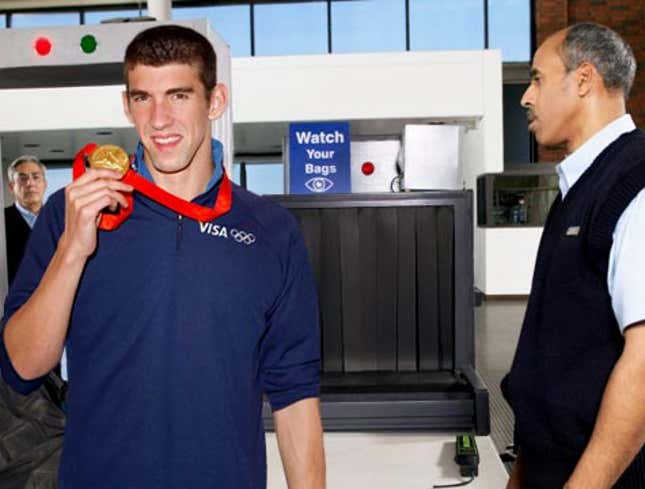 Image for article titled Michael Phelps Winks Mischievously After Setting Off Airport Metal Detector