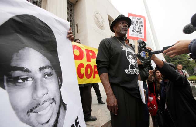 Cephus “Bobby” Johnson stands on the steps of the U.S. District Court building in Los Angeles in 2011, protesting the release of Johannes Mehserle, the former San Francisco Bay area transit officer who fatally shot Johnson’s nephew Oscar Grant.