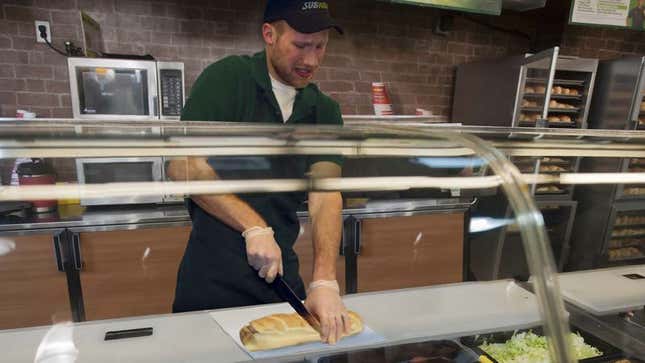 Image for article titled Subway Employee Still Unnerved By High-Pitched Screech Sandwiches Make When Cut In Half