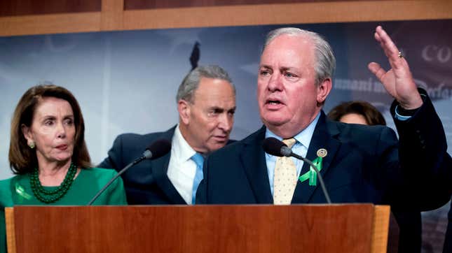 Rep. Mike Doyle, D-Pa. accompanied by Senate Minority Leader Sen. Chuck Schumer and House Speaker Nancy Pelosi on Capitol Hill in Washington, Wednesday, May 16, 2018.