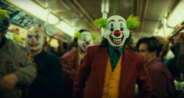 Joaquin Phoenix in a clown mask in Todd Philips’ Joker.