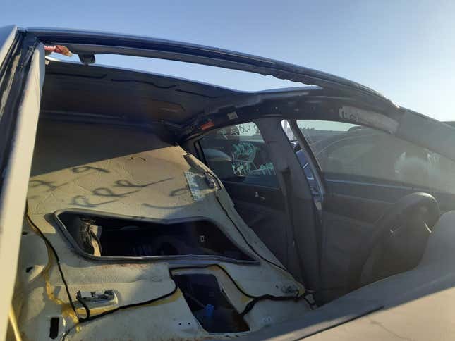 Image for article titled How I Fixed A Broken Sunroof In One Of The Most Unreliable Cars Of The Modern Era
