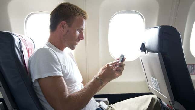 Image for article titled Disheartened Man Expected At Least One Text While Checking Phone After Flight