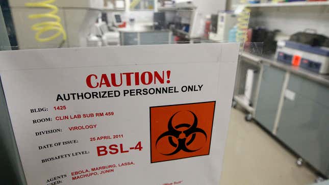 A 2011 file photo showing a warning sign on a door at the Fort Detrick facility. 