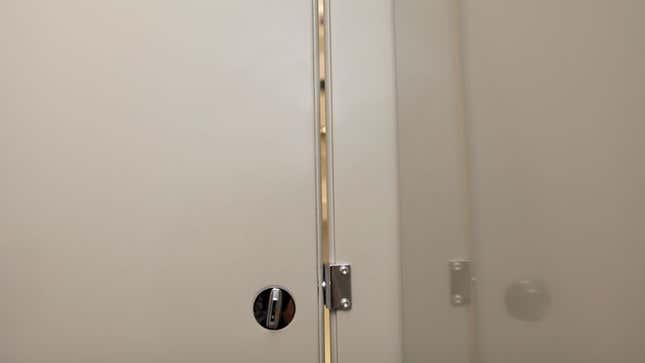 Image for article titled Narrow Gaps In Bathroom Stall Doors To Be Widened Monday