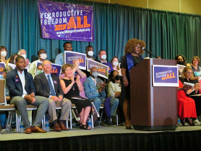 Elder Leslie Mathews, an organizer with Michigan United, joins Leaders of the Reproductive Freedom for All campaign as they speak to supporters on Monday, July 11, 2022, in Lansing Mich.