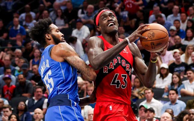 Nov 8, 2023; Dallas, Texas, USA; Toronto Raptors forward Pascal Siakam (43) looks to shoot as Dallas Mavericks forward Derrick Jones Jr. (55) defends during the second half at American Airlines Center.