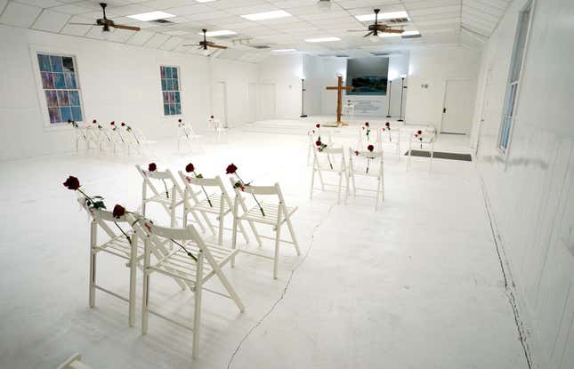 Chairs and roses mark where worshipers were found dead at the First Baptist Church of Sutherland Springs.