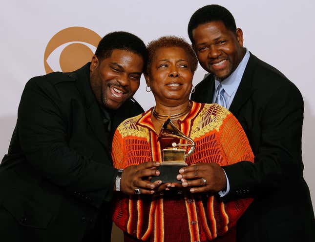 LOS ANGELES, CA - FEBRUARY 10: The family of Gerald Levert (L-R) younger brother Sean Levert, mother Martha Levert and record producer Edwin “Tony” Nicholas pose with Gerald’s posthumous award for the Best Traditional R&amp;B Vocal Performance “In My Songs” in the press room during the 50th annual Grammy awards pre-telecast show held at the Staples Center on February 10, 2008 in Los Angeles, California. 